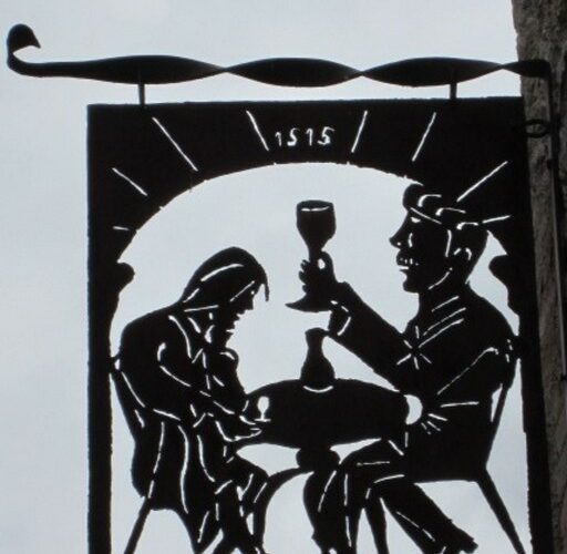 Enseigne en fer forgé du café du Commerce